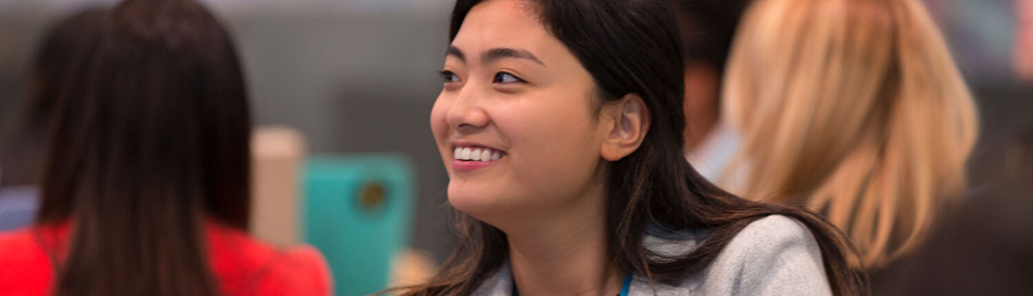 young woman on campus serving as a forte ambassador